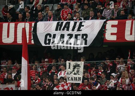 Soccer - UEFA Champions League - Quarter Final - First Leg - Bayern Munich v Manchester United - Allianz Arena. Bayern Munich fans hold up hate Glazer protest banners in the stands against the clubs current owners Stock Photo