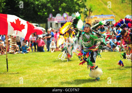 Native Canadians hold a Pow Wow at a Canada Day celebration held in the Canadian city of London, Ontario. Stock Photo