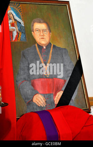 A portrait and tributes, on the altar St Andrew Bobola's RC Polish Church, during a mass for Parish Priest Monsignor Bronislav Gostomski, who dies in the Polish plane crash. Stock Photo