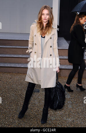 Rosie Huntington-Whiteley arrives at the Burberry Fashion show in London. Stock Photo