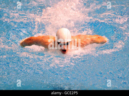 Stockport Metro's Michael Rock on his way to winning the Men's Open 100m Butterfly Second semi final during the British Swimming Championships at Ponds Forge, Sheffield. Stock Photo