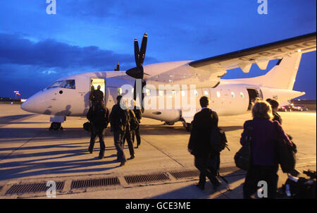 Members of Conservative Party leader David Cameron's election campaign team board a plane in Leeds, after Prime Minister Gordon Brown called the general election for May 6. Stock Photo