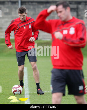 Liverpool's Steven Gerrard (left) and Jamie Carragher during a training session at Melwood Training Ground, Liverpool. Stock Photo