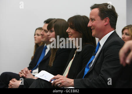 Conservative Party leader David Cameron, his wife Samantha and Shadow Chancellor George Osborne listen to a speech by the boss of Arcadia Sir Philip Green at Fashion Retail Academy, following last night's leaders debate. Stock Photo