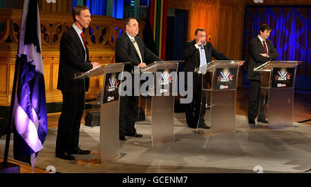 (Left to right) Scottish Secretary Jim Murphy, First Minister Alex Salmond, shadow Scottish secretary David Mundell and Liberal Democrat Scottish spokesman Alistair Carmichael prepare to take part in Scotland's second live TV debate of the General Election campaign, broadcast live from Edinburgh on Sky News. Stock Photo