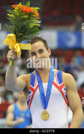 Great Britain's Daniel Keatings celebrates winning gold on the pommel horse event during the Individual Apparatus Final of the European Artistic Championships at the NIA, Birmingham. Stock Photo