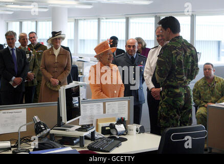 Britain's Queen Elizabeth II meets delegates as she officially open one of the UK's top military buildings - the Permanent Joint Headquarters - in Northwood, West London. Stock Photo