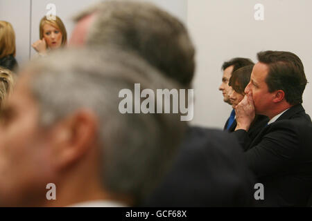 Conservative Party leader David Cameron and his wife Samantha, Shadow Chancellor George Osborne and boss of Marks & Spencer Sir Stuart Rose (Left) listen to an address by the boss of Arcadia Sir Philip Green at the Fashion Retail Academy, following last night's leaders debate. Stock Photo