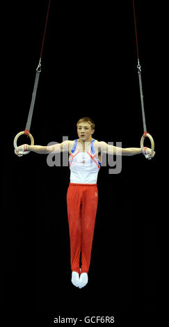 Great Britain's Sam Oldham competes on the rings during the All Round Final of the European Gymnastics Championships at the NIA, Birmingham. Stock Photo