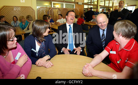 Conservative Leader David Cameron, pictured with Northern Ireland Health Minister Michael McGimpsey, talking to staff at Dundonald Hospital in Belfast. Stock Photo