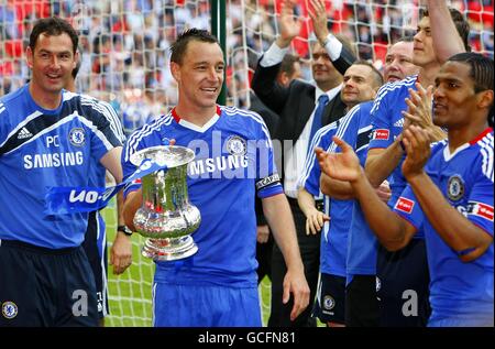 Soccer - FA Cup - Final - Chelsea v Portsmouth - Wembley Stadium. Chelsea's John Terry celebrates with the FA Cup trophy after the game Stock Photo