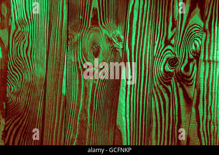 Perfect light dark green reddish greenish irregular old dark bright wood timber surface texture background Stock Photo