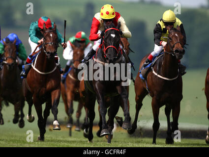 Captain Carey (centre) ridden by Tom McLaughlin wins the Presonal Shopping Service at Bridgend Desinger Outlet Handicap Stakes during Ladies Day at Chepstow Racecourse. Stock Photo