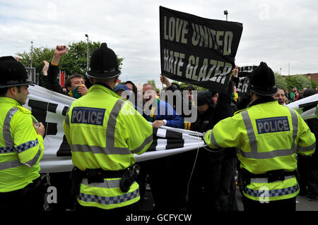 Manchester United fans protest outside out trafford before during the Barclays Premier League match at Old Trafford, Manchester. Stock Photo