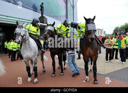 Manchester United fans protest outside out trafford before the Barclays Premier League match at Old Trafford, Manchester. Stock Photo