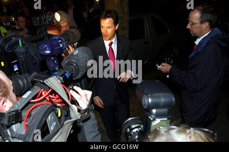 Liberal Democrat party leader Nick Clegg arrives at Local Government House, London, after Britain's new Prime Minister David Cameron had an audience with The Queen at which she invited him to form a new government. Stock Photo