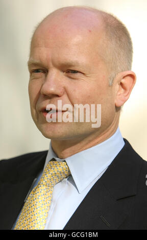 William Hague leaves the Millbank television studios, in Westminster, London for talks in Downing Street with the new Prime Minister David Cameron. Stock Photo