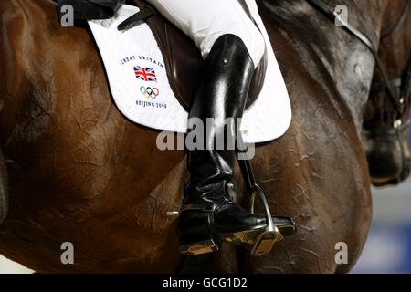 Britain's Kristina Cook on Miners Frolic during the dressage test at the Shatin Equestrian Centre in Hong Kong, China, on the first day of the Beijing Olympics. Stock Photo