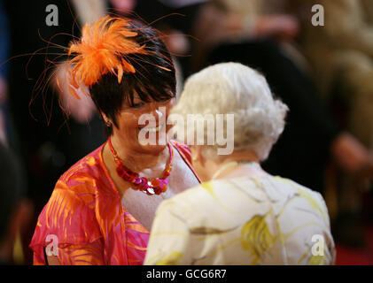 Marjorie Oaten, from Hull, receives an MBE from Britain's Queen Elizabeth II during investitures at Buckingham Palace, London. Stock Photo