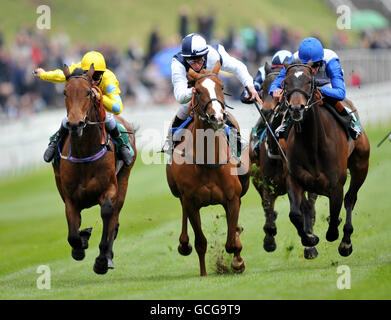 Gertrude Bell ridden by William Buick up (centre) wins from Acquainted ridden by Richard Hughes (right) and Champagnelifestyle ridden by Michael Hills (left) Stock Photo