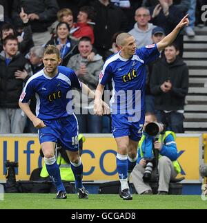 Millwall's Steve Morison (right) celebrates after scoring his second and his sides third goal of the game Stock Photo