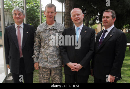 General Stanley McChrystal, Commander of International Security Assistance Force (ISAF) meets (from left) International Development Secretary Andrew Mitchell, Foreign Secretary William Hague and Defence Secretary Liam Fox at ISAF HQ in Kabul, Afghanistan during a visit by the politicians to the area. Stock Photo