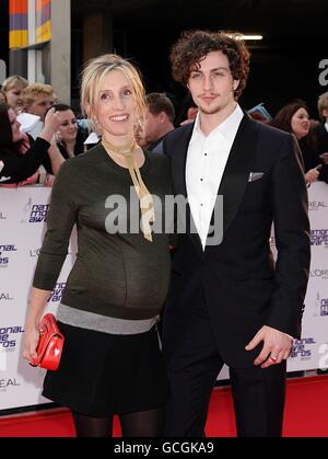 Sam Taylor-Wood and Aaron Johnson arriving for the 2010 National Movie Awards at the Royal Festival Hall, London. Stock Photo