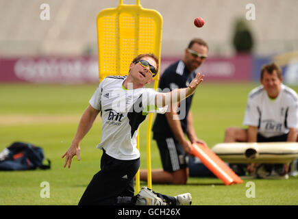 Cricket - npower Second Test - England v Bangladesh - England Nets Session - Old Trafford. England's Eoin Morgan takes a catch during practice Stock Photo