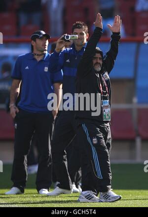 Soccer - 2010 FIFA World Cup South Africa - Group B - Argentina v Nigeria - Ellis Park. Argentina's Head Coach Diego Maradona (right) prior to kick off. Stock Photo