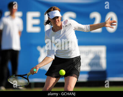 Tennis - The Nottingham Masters 2010 - Day Two - Nottingham Tennis Centre. Switzerland's Martina Hingis in action against the Netherlands' Michaella Krajicek Stock Photo