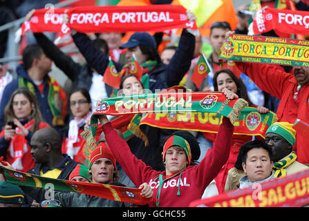 Soccer - 2010 FIFA World Cup South Africa - Group G - Ivory Coast v Portugal - Nelson Mandela Bay Stadium. Portugal fans cheer on their side in the stands Stock Photo