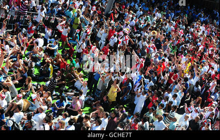 England fans watching England play against Slovenia during the World Cup Group Qualifying match at a big screen show at Humberstone Gate, in Leicester city centre. Stock Photo