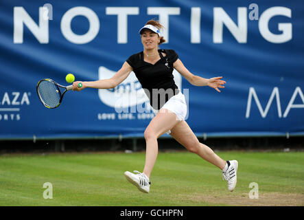 Tennis - The Nottingham Masters 2010 - Day Four - Nottingham Tennis Centre. Switzerland's Martina Hingis in action against the Netherlands' Michaella Krajicek Stock Photo