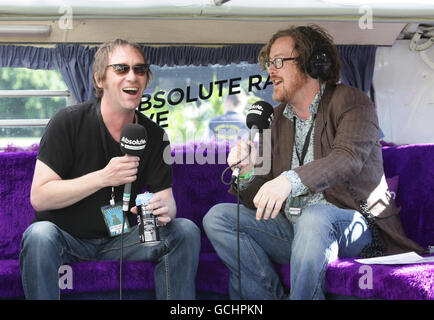 Simon Fowler (left) of Ocean Colour Scene during his interview with DJ Geoff Lloyd at Absolute Radio, at the Isle of Wight Festival, at Seaclose Park in Newport. PRESS ASSOCIATION Photo. Picture date: Sunday June 13, 2010. See PA story SHOWBIZ Festival. Photo credit should read: Yui Mok/PA Wire Stock Photo