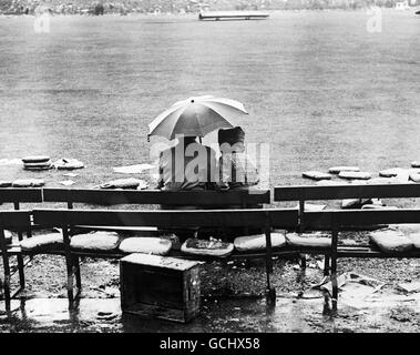 Cricket - International England v Australia - 4th Test, Day 3 - Leeds. Two lonely spectators brave the rain Stock Photo