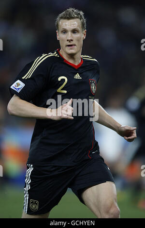 Soccer - 2010 FIFA World Cup South Africa - Group D - Ghana v Germany - Soccer City Stadium. Marcell Jansen, Germany Stock Photo