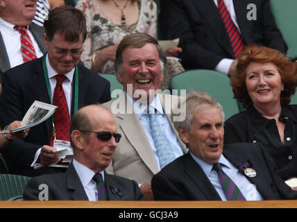 Sir Terry Wogan (centre) and his wife Lady Helen (centre right) in the stands behind HRH The Duke of Kent (bottom left) and Tim Phillips (bottom right) Stock Photo