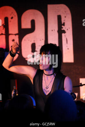 Joan Jett of Joan Jett and the Blackhearts, performing on stage at The 100 Club in central London. Stock Photo