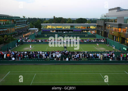 A general view of Great Britain's Katie O'Brien in action during Day One of the 2010 Wimbledon Championships at the All England Lawn Tennis Club, Wimbledon. Stock Photo