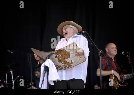 Rolf Harris performs with his wobble board on the first day of music on ...