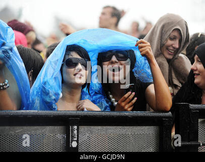 Members of the crowd watch JLS perform at T4 On The Beach 2010, at Weston-Super-Mare in Somerset. Stock Photo