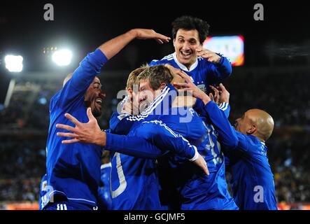 Soccer - 2010 FIFA World Cup South Africa - Group B - Greece v Argentina - Peter Mokaba. Argentina's Martin Palermo (centre) celebrates with his team mates after scoring their second goal. Stock Photo