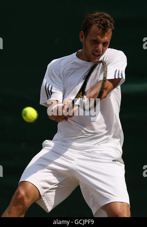 Tennis - 2010 Wimbledon Championships - Day Five - The All England Lawn Tennis and Croquet Club. France's Paul-Henri Mathieu in action against Russia's Mikhail Youzhny Stock Photo
