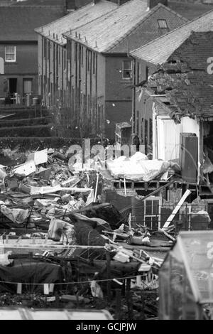 Debris strewn gardens in Lockerbie, after a Pan Am jumbo jet crashed onto the village, killing all 258 on board and 17 people on the ground. Stock Photo