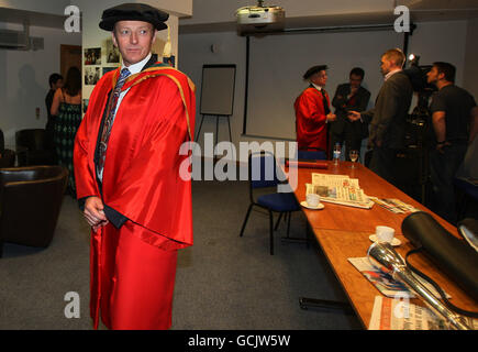 Former PSNI Chief Constable, Sir Hugh Orde, who received a of Doctor of Laws honorary degree (LLD) in recognition of his services to policing, at the University Of Ulster summer graduation ceremony at the Waterfront Hall in Belfast. Stock Photo