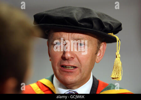 Former PSNI Chief Constable, Sir Hugh Orde, who received a of Doctor of Laws honorary degree (LLD) in recognition of his services to policing, at the University Of Ulster summer graduation ceremony at the Waterfront Hall in Belfast. Stock Photo