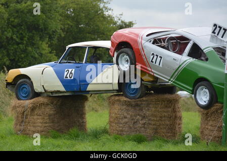 Stock Cars - Piled on hay stacks Stock Photo