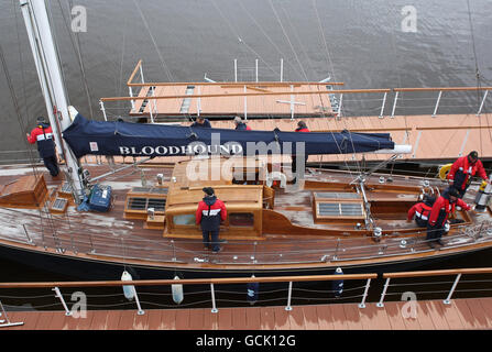 The Royal 63 ft racing yacht Bloodhound arrives at its new berth alongside The Royal Yacht Britannia at the Port of Leith, Edinburgh. The craft will form part of a new exhibition on the Royal Family's passion for sailing after being bought by trustees earlier this year. Stock Photo