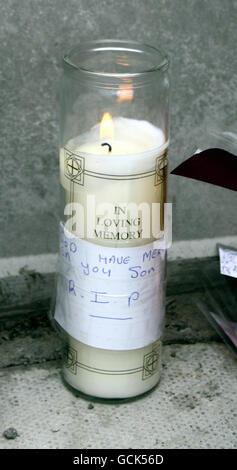 A single candle blows in the wind outside the home of Raoul Moat in Fenham, Newcastle, following his death in the early hours of this morning. Stock Photo