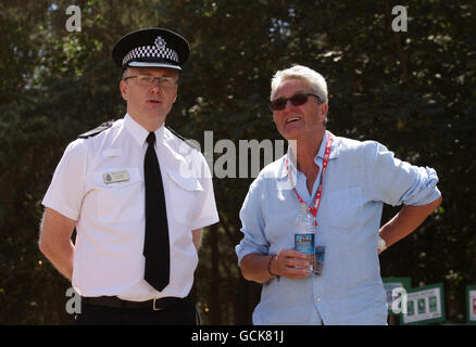 Superintendent Ian Sidney (left) from the Suffolk Constabulary with Latitude Festival organiser Melvin Benn after their press conference concerning the assaults at the festival on Thursday and Friday, in Henham Park, Southwold, Suffolk. Stock Photo